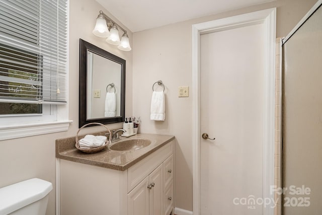 5329 Glenbrier Dr, Charlotte, NC 28212 - full bathroom with toilet, vanity, and a shower with shower door