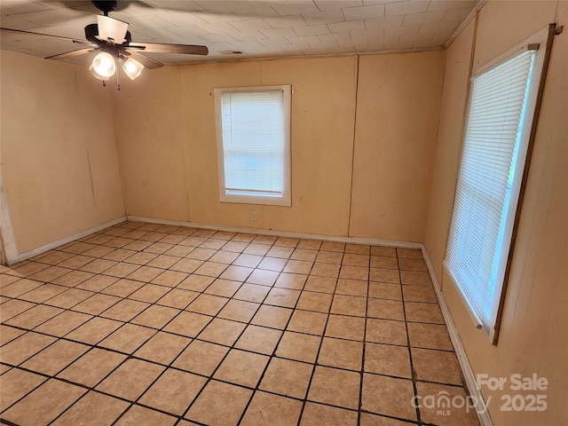 empty room with a ceiling fan