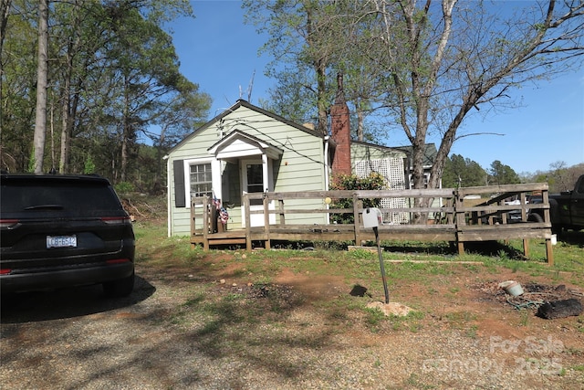 2547 Gastonia Hwy, Lincolnton, NC 28092 - view of front facade with a chimney and a deck