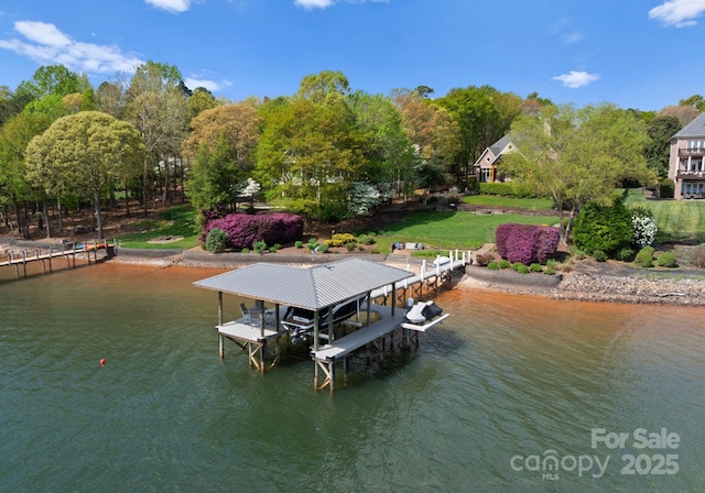 view of dock featuring a water view and boat lift