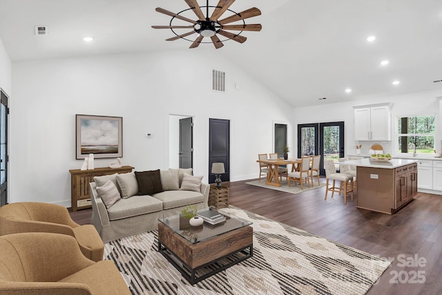 676 Chapel Hill Dr, Troy, NC 27371 - living area with a ceiling fan, high vaulted ceiling, dark wood-type flooring, recessed lighting, and baseboards