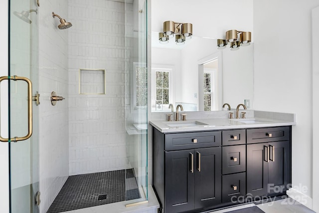 676 Chapel Hill Dr, Troy, NC 27371 - bathroom featuring a stall shower and double vanity