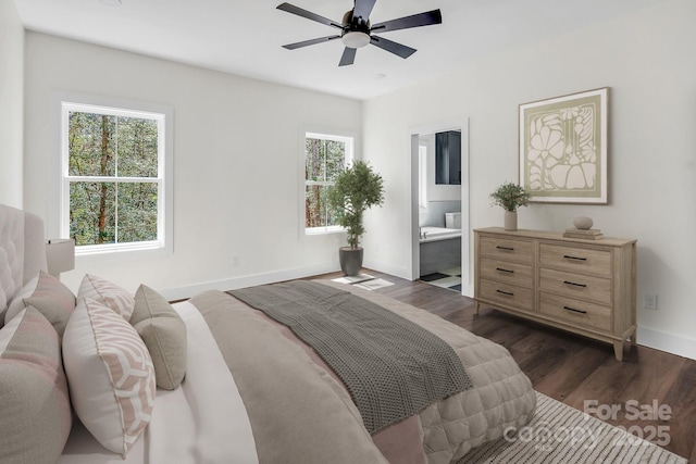 676 Chapel Hill Dr, Troy, NC 27371 - bedroom with dark wood finished floors, baseboards, ensuite bath, and ceiling fan