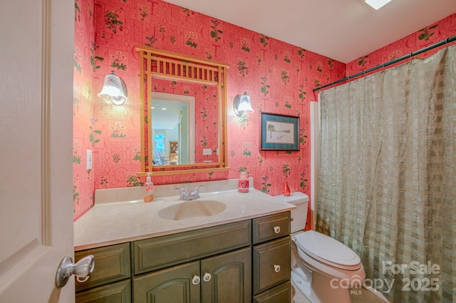 161 Hamburg Mountain Rd, Weaverville, NC 28787 - bathroom featuring wallpapered walls, vanity, toilet, and a shower with shower curtain