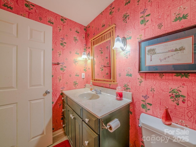 161 Hamburg Mountain Rd, Weaverville, NC 28787 - bathroom with wallpapered walls, vanity, and toilet