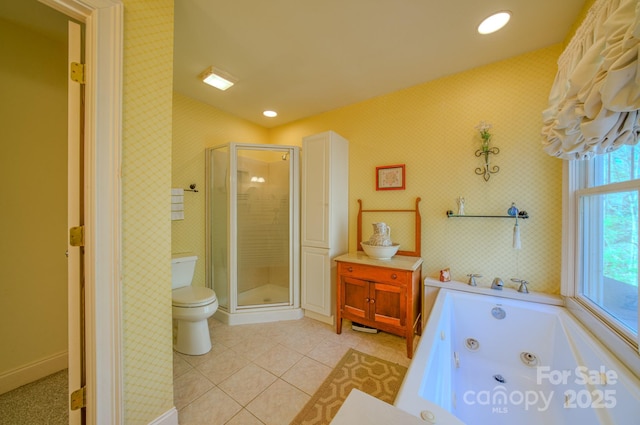 161 Hamburg Mountain Rd, Weaverville, NC 28787 - bathroom with toilet, a shower stall, a whirlpool tub, tile patterned floors, and wallpapered walls