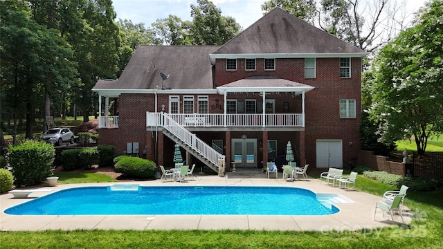 101 Saddletree Rd, Lincolnton, NC 28092 - rear view of house featuring stairway, french doors, brick siding, a wooden deck, and a patio