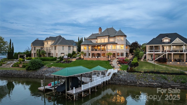 325 Ivy Arbor Cir, Rock Hill, SC 29732 - back of house featuring a balcony, a water view, boat lift, and a chimney