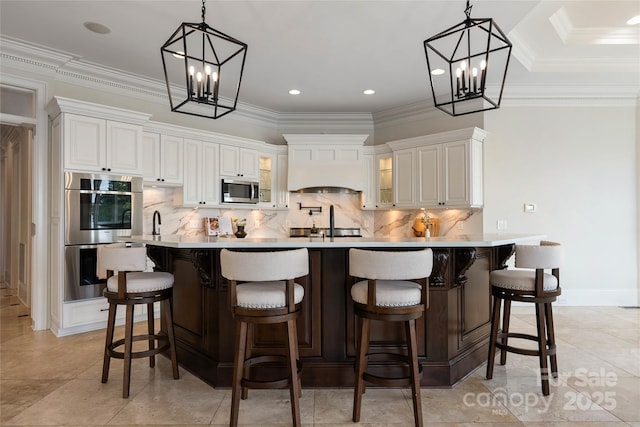 325 Ivy Arbor Cir, Rock Hill, SC 29732 - kitchen with appliances with stainless steel finishes, a chandelier, white cabinetry, light countertops, and crown molding