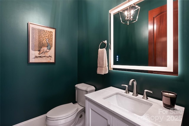 325 Ivy Arbor Cir, Rock Hill, SC 29732 - bathroom featuring a chandelier, toilet, and vanity