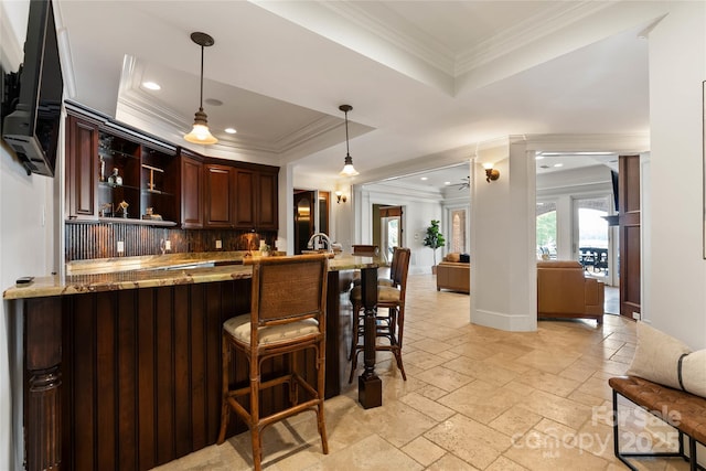 325 Ivy Arbor Cir, Rock Hill, SC 29732 - indoor wet bar with ornamental molding, recessed lighting, stone tile floors, decorative light fixtures, and a raised ceiling