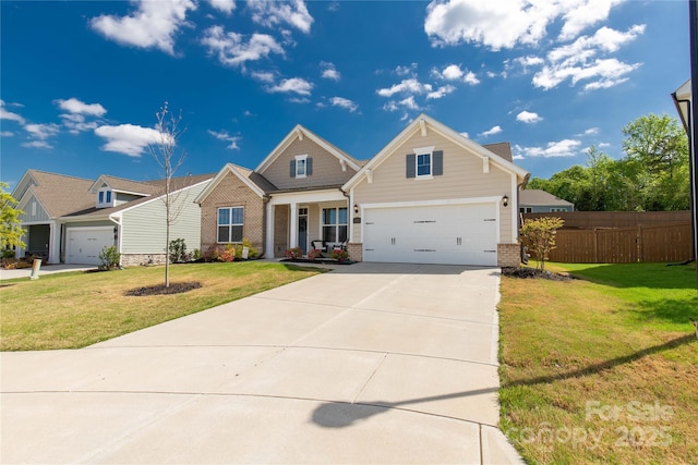 5119 Moselle Ave, Indian Land, SC 29707 - craftsman-style house featuring brick siding, driveway, covered porch, and an attached garage