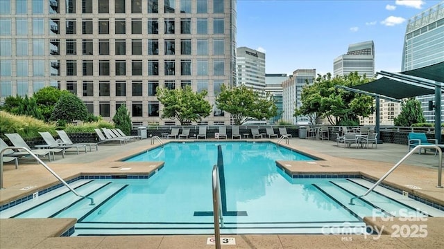 333 W Trade St Unit 1802, Charlotte, NC 28202 - community pool featuring a view of city and a patio