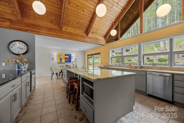 kitchen featuring stainless steel appliances, wooden ceiling, high vaulted ceiling, and light tile patterned floors