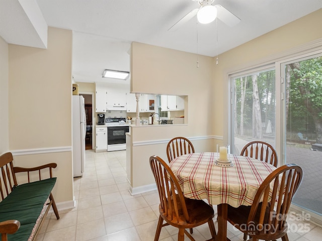 2248 Lawton Bluff Rd, Charlotte, NC 28226 - dining space with light tile patterned flooring and a ceiling fan