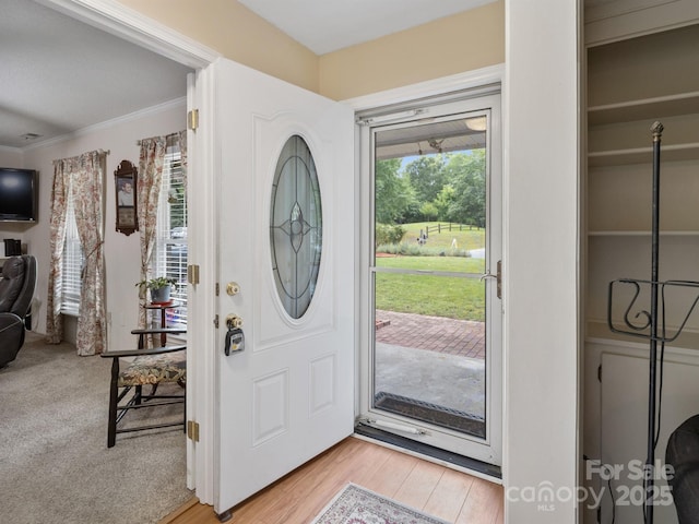 2248 Lawton Bluff Rd, Charlotte, NC 28226 - foyer with crown molding and light wood-style floors