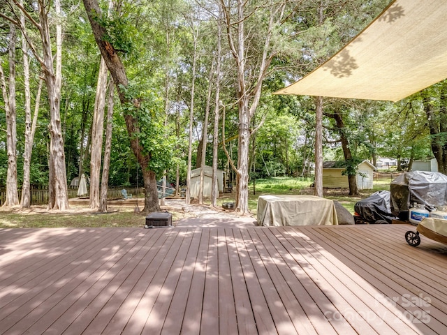 2248 Lawton Bluff Rd, Charlotte, NC 28226 - deck featuring a shed and view of scattered trees