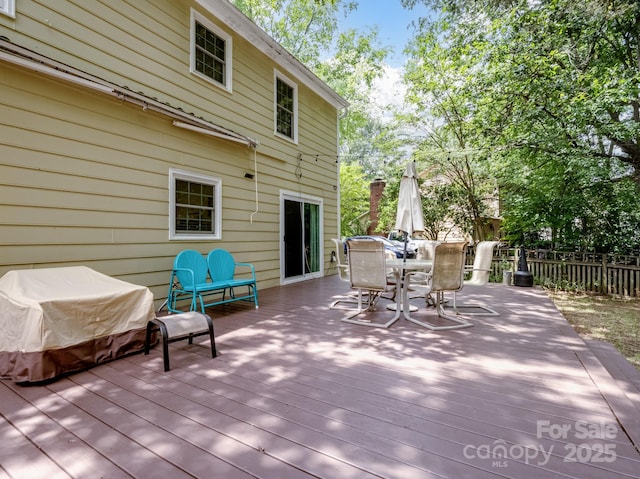 2248 Lawton Bluff Rd, Charlotte, NC 28226 - wooden terrace featuring outdoor dining space and a grill