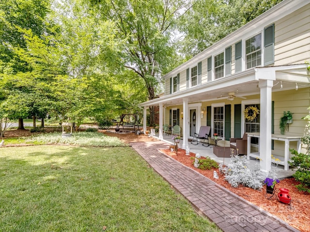 2248 Lawton Bluff Rd, Charlotte, NC 28226 - view of grassy yard with ceiling fan