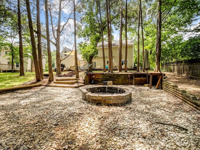 2248 Lawton Bluff Rd, Charlotte, NC 28226 - view of yard with an outdoor fire pit and a wooden deck