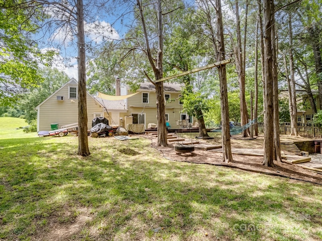 2248 Lawton Bluff Rd, Charlotte, NC 28226 - view of grassy yard with an outdoor fire pit