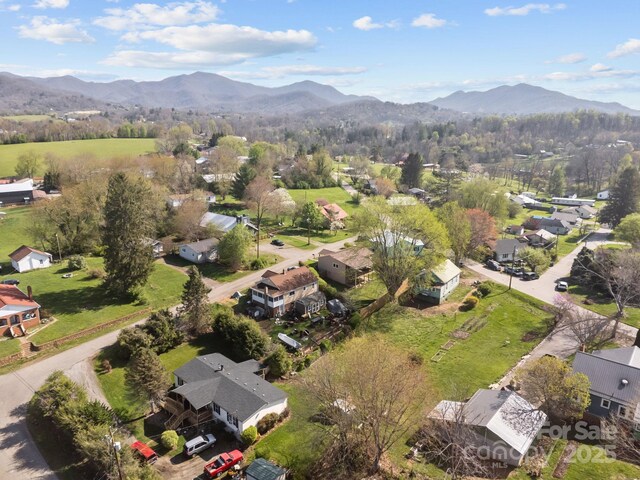 aerial view featuring a mountain view and a residential view