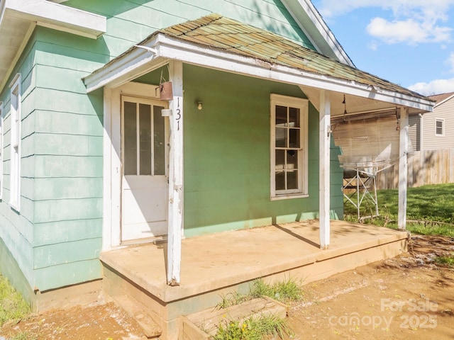 view of property exterior featuring fence