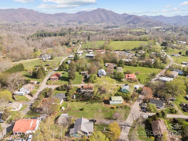 drone / aerial view featuring a mountain view and a residential view