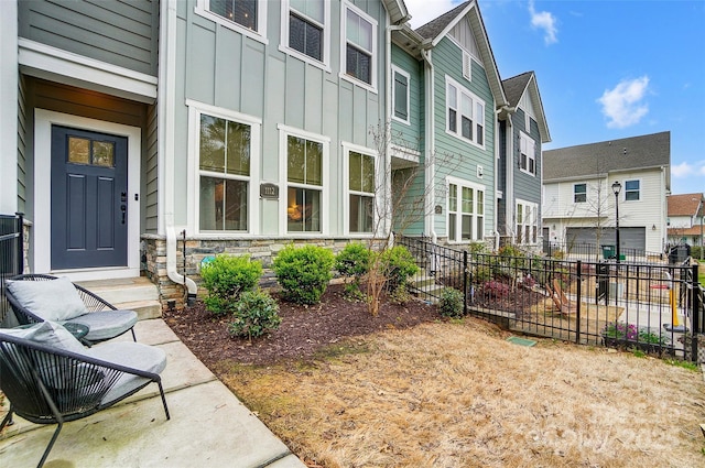 exterior space featuring fence and a residential view