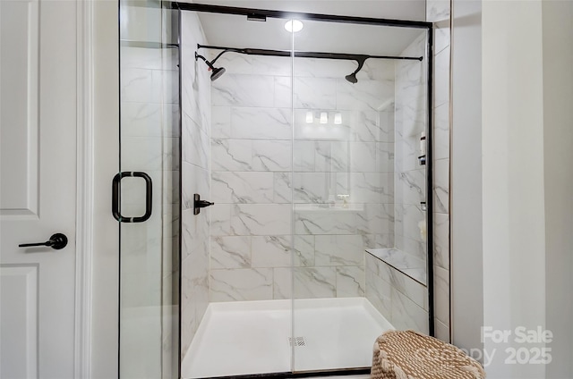 bathroom with a stall shower