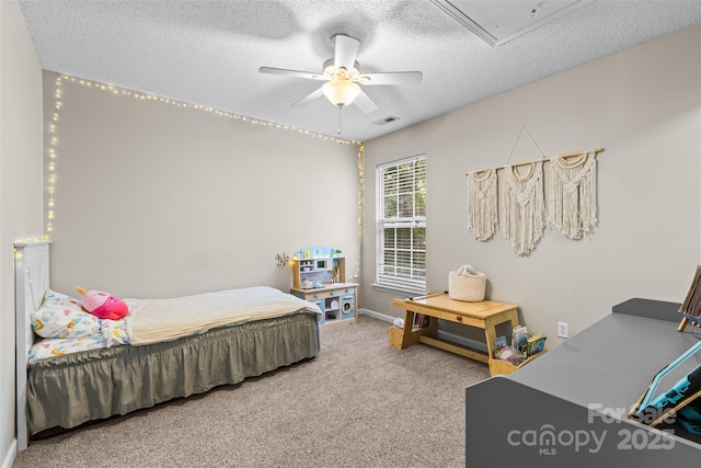 512 Red Oak Ct, Tega Cay, SC 29708 - carpeted bedroom with attic access, visible vents, ceiling fan, and a textured ceiling