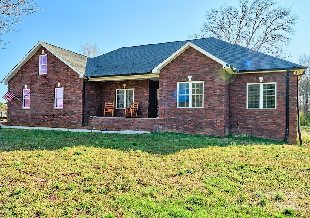 28926 Hartsell Rd, Albemarle, NC 28001 - single story home with a front lawn, a shingled roof, and brick siding