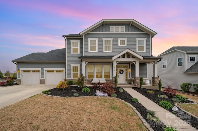 2332 Paddlers Cove Dr, Lake Wylie, SC 29710 - craftsman inspired home featuring a porch, an attached garage, stone siding, board and batten siding, and concrete driveway