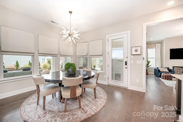 2332 Paddlers Cove Dr, Lake Wylie, SC 29710 - dining area with dark wood-type flooring, baseboards, a notable chandelier, and visible vents