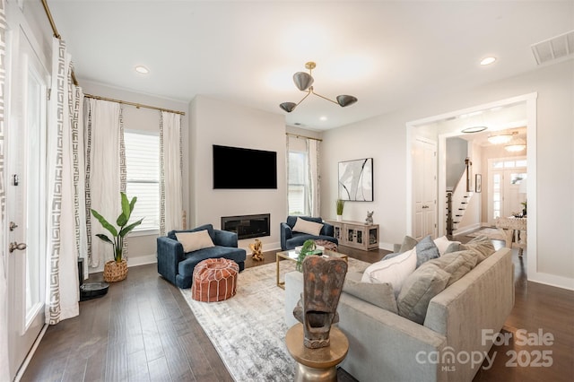 2332 Paddlers Cove Dr, Lake Wylie, SC 29710 - living area with visible vents, baseboards, a glass covered fireplace, and dark wood-style floors