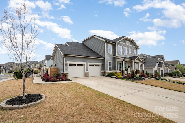 2332 Paddlers Cove Dr, Lake Wylie, SC 29710 - view of front of home with a residential view, driveway, a front yard, a garage, and fence