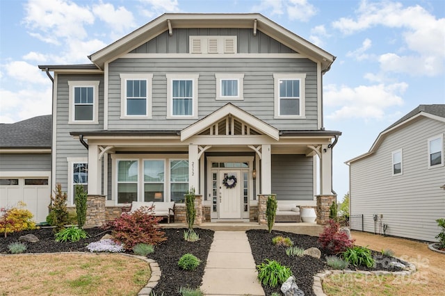 2332 Paddlers Cove Dr, Lake Wylie, SC 29710 - craftsman-style home featuring covered porch, stone siding, and board and batten siding