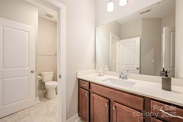 2332 Paddlers Cove Dr, Lake Wylie, SC 29710 - bathroom with toilet, vanity, baseboards, and visible vents
