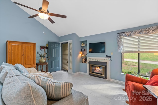 407 Sweeten Way, Asheville, NC 28803 - living area with high vaulted ceiling, a glass covered fireplace, baseboards, and ceiling fan