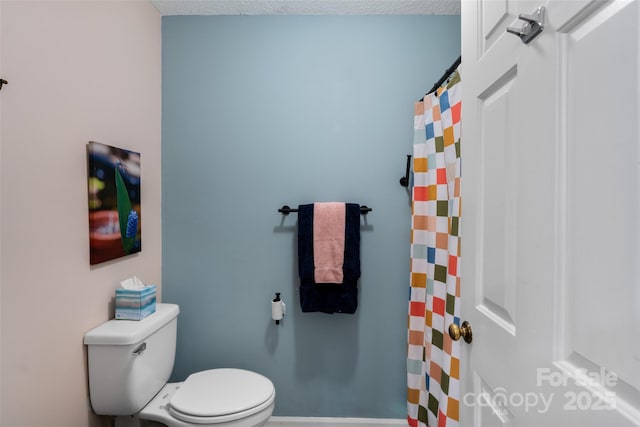 407 Sweeten Way, Asheville, NC 28803 - bathroom with toilet, curtained shower, and baseboards