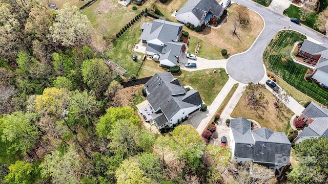 birds eye view of property with a residential view