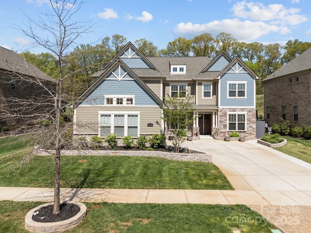 10904 Kilkenny Dr, Matthews, NC 28105 - craftsman-style home featuring stone siding and a front yard