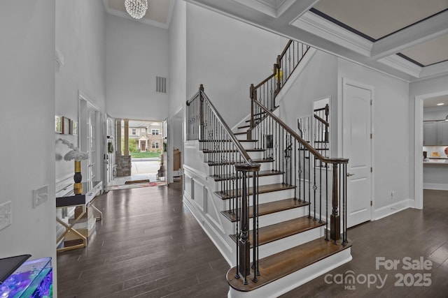 10904 Kilkenny Dr, Matthews, NC 28105 - staircase with hardwood / wood-style floors, crown molding, a high ceiling, and beam ceiling