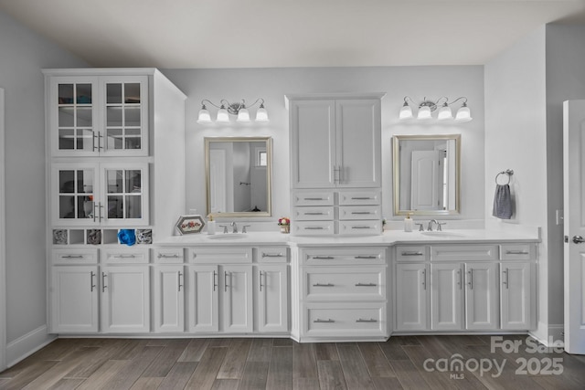 10904 Kilkenny Dr, Matthews, NC 28105 - bathroom with double vanity and wood finished floors