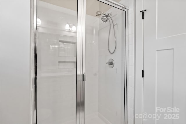 bathroom with a stall shower