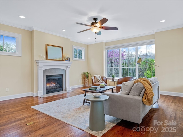 17 Kiftsgate Ct, Asheville, NC 28804 - living area with a fireplace with flush hearth, recessed lighting, wood finished floors, a ceiling fan, and baseboards