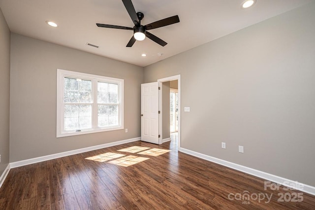 1314 39th Street Cir SW, Hickory, NC 28602 - unfurnished room featuring visible vents, baseboards, ceiling fan, wood finished floors, and recessed lighting