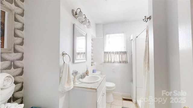 608 Forney Ave, Lincolnton, NC 28092 - full bath featuring toilet, tile patterned floors, vanity, and curtained shower