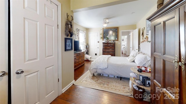608 Forney Ave, Lincolnton, NC 28092 - bedroom featuring baseboards and dark wood finished floors