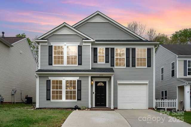 2005 Dunsmore Ln, Waxhaw, NC 28173 - traditional home with a garage, concrete driveway, and central AC unit